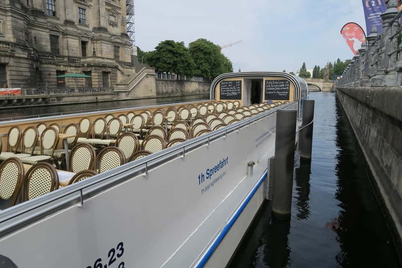 Berlin: Boat Sightseeing Cruise with Audioguide - Inside the cruise: heated comfort, retractable roof, and onboard basics