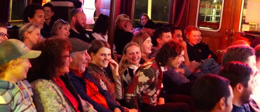 Berlin: Eastern European Comedy Special Ticket and Free Shot - The night in order: doors, host welcome, and getting seated
