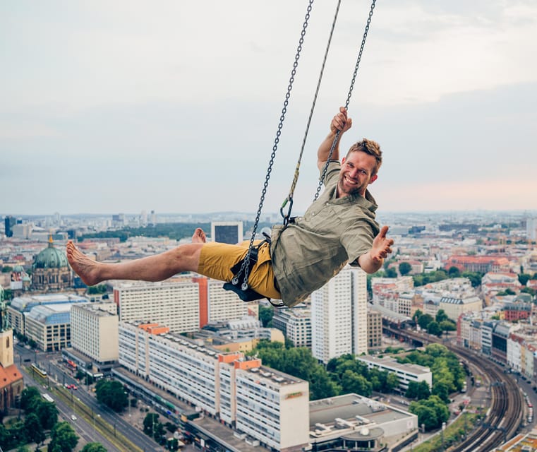 Berlin: Highest Swing in Europe - The view over Alexanderplatz: TV Tower, rooftops, and real weather