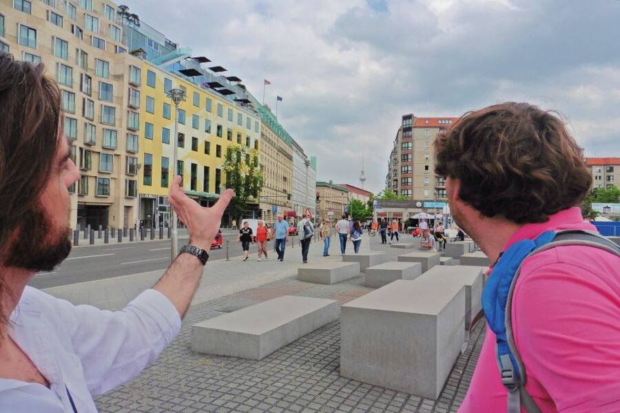 Berlin: Historical Sights & Berlin Wall Tour with a Berliner - Brandenburg Gate and the meaning of 28 years of isolation