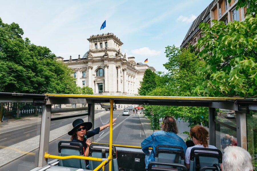 Berlin: Hop-on Hop-off Bus Tour with Live Commentary - Gendarmenmarkt to Alexanderplatz: Neptunbrunnen, TV Tower Views, and Easy Hops