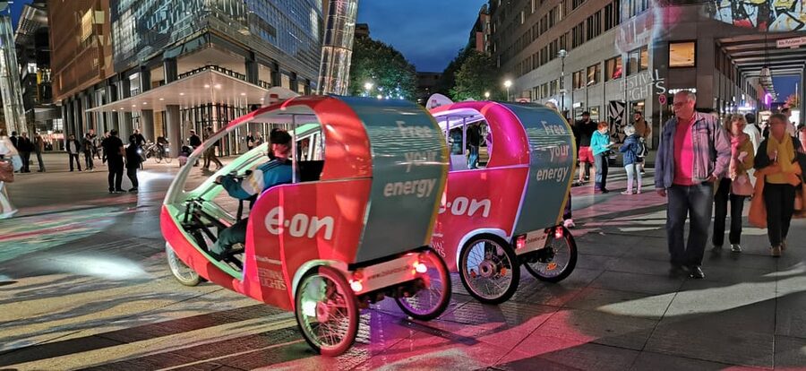 Berlin: Illuminated Berlin by Bike Taxi - Potsdamer Platz at night: video mapping as a show-stopper