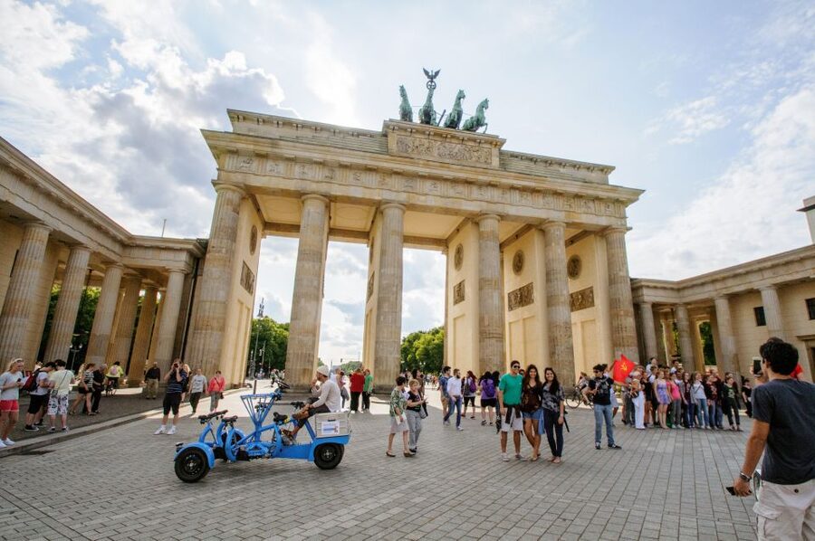 Explore Berlin: Walking Tour of All The Iconic Sites - Meeting at Friedrichstrasse, Finding the Yellow Umbrellas Fast