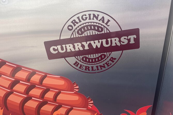 Food tasting tour in Berlin of HIDDEN GEMS (Small Groups) - Torstraße 122: currywurst with curry ketchup and a classic drink