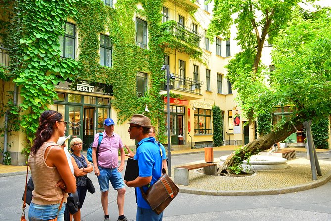 Modern Berlin Private Walking Tour: Diverse, Vibrant and Exciting German Capital - Stop 3: Prenzlauer Berg, gentrified streets with a still-visible past