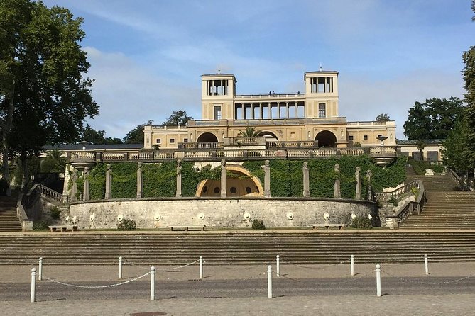 Potsdam Bike Tour with Rail Transport from Berlin - First big payoff: Sanssouci Palace exterior and the Frederick the Great story