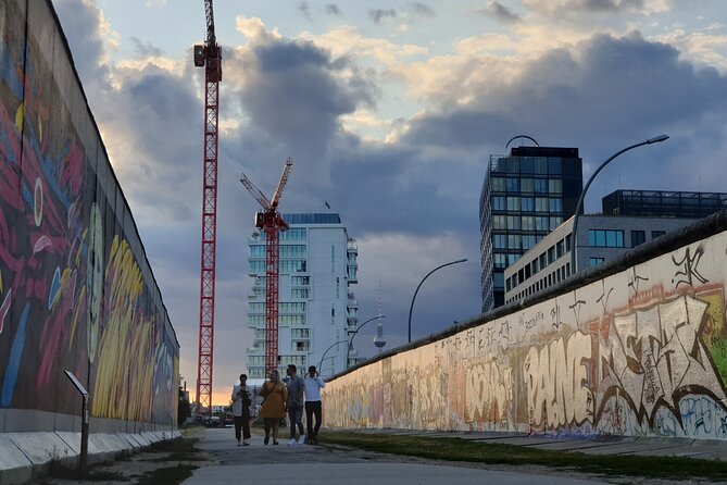 Small Group Walking Tour of East Berlin with a French Guide - Alexanderplatz: where protest energy meets political repression